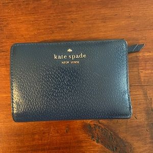 Kate Spade medium sized blue wallet.